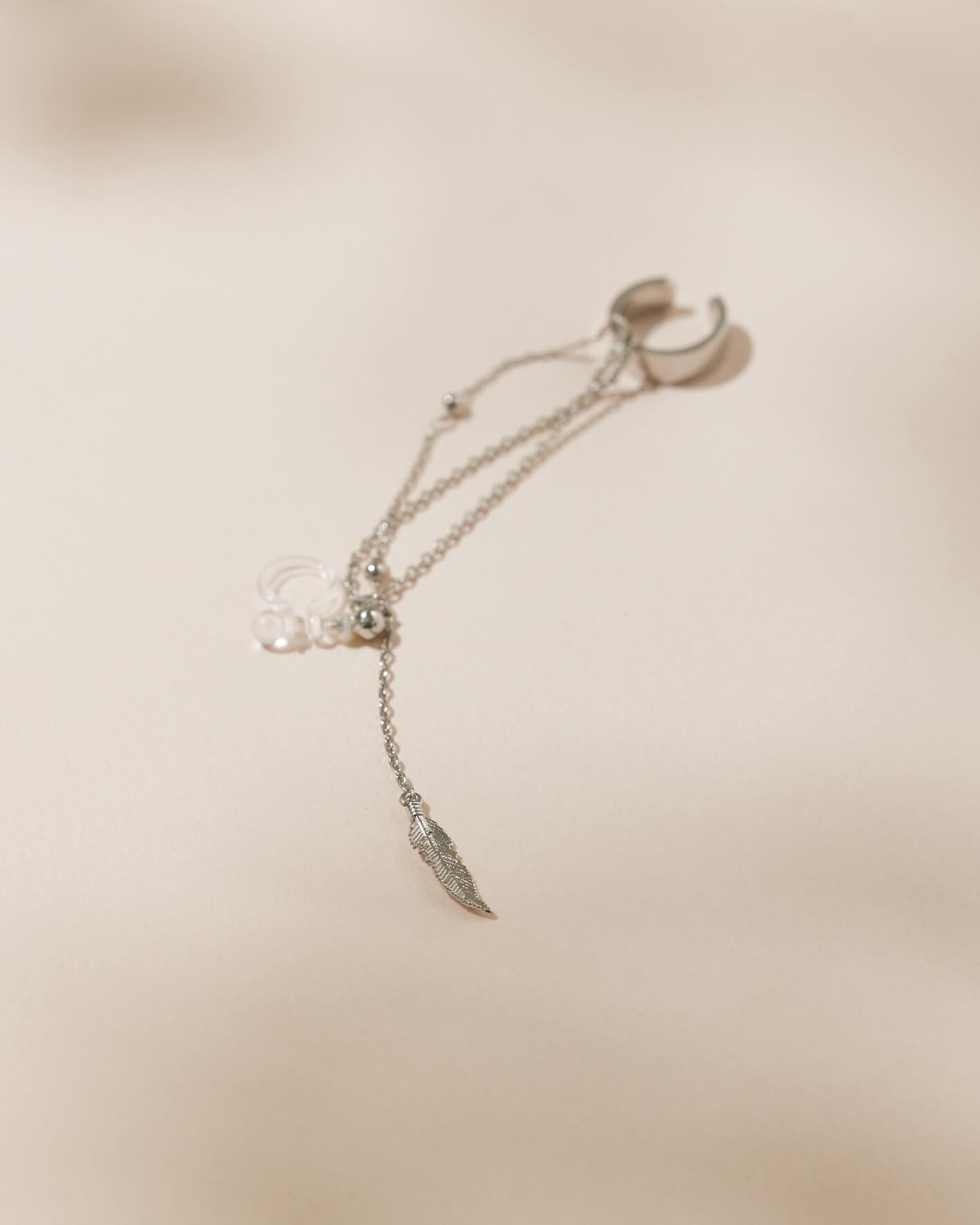 羽翼。矽膠夾式/純銀耳針耳環(單個)